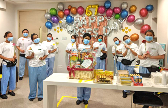 ​Sister Suriana (centre) celebrating Nurses' Day last year with her nurses at Ward 67.